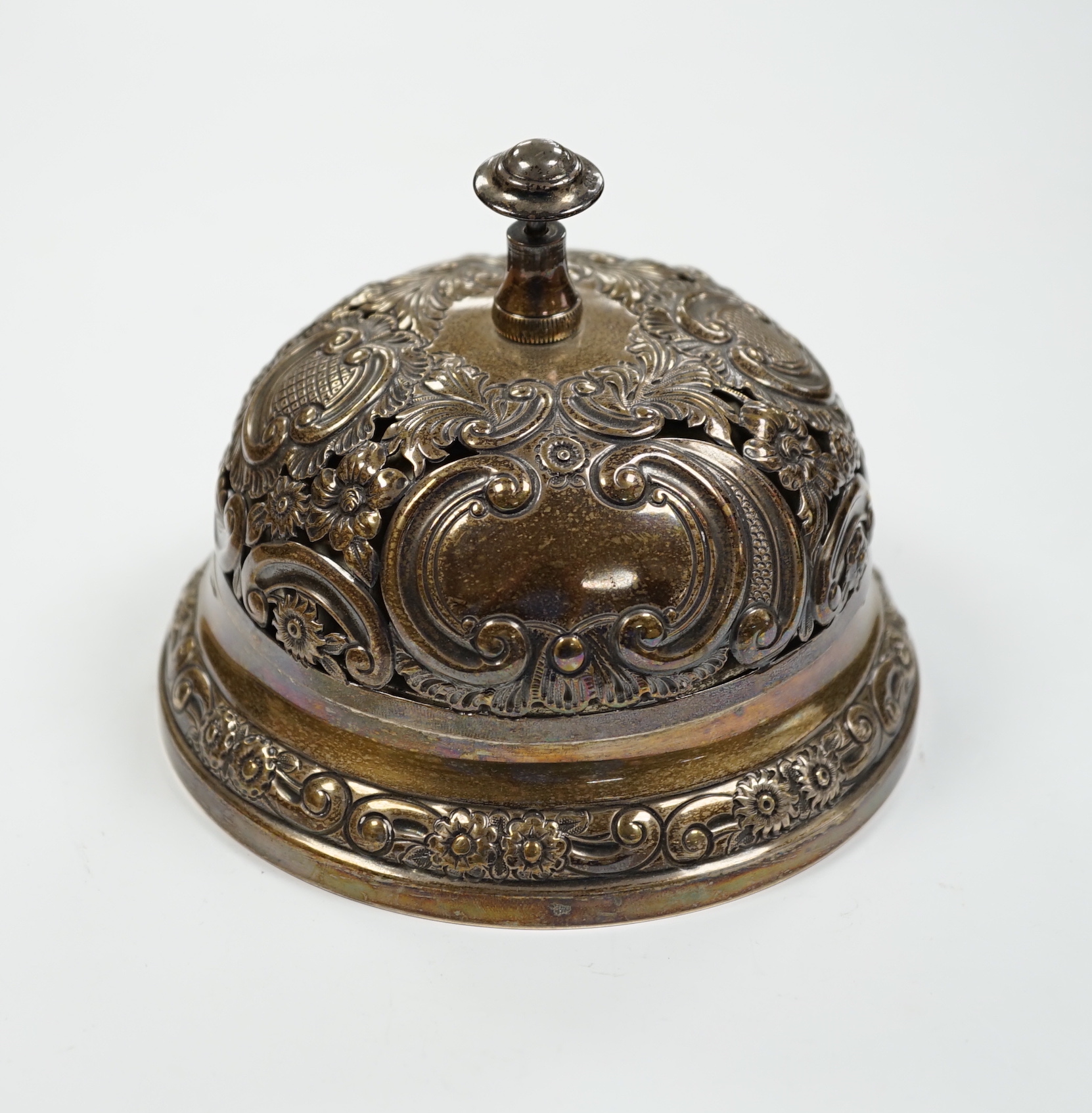 A late Victorian pierced silver mounted table bell, Samuel Walton Smith, Birmingham, 1894, base diameter 13.2cm.